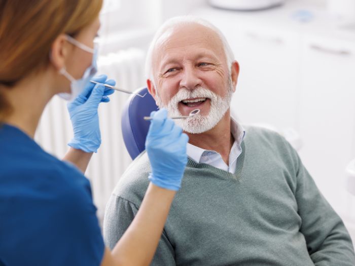 senior man at dental checkup